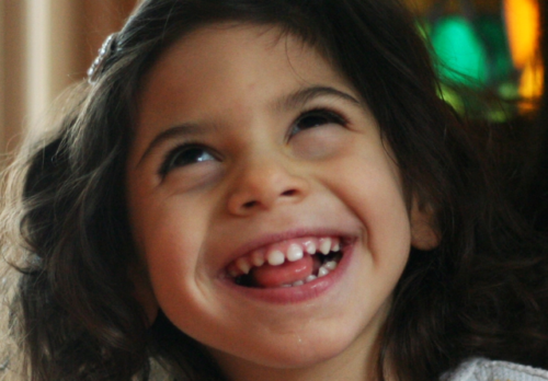 A photo of Ava‘s smiling face helps communicate the joy of gift giving